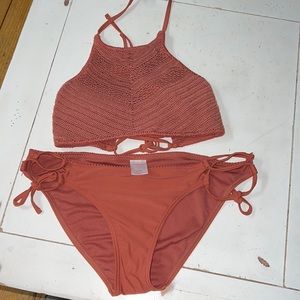 Rust colored crochet bikini.